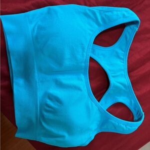 NVGTN Blue sports bra Caribbean blue size medium EUC